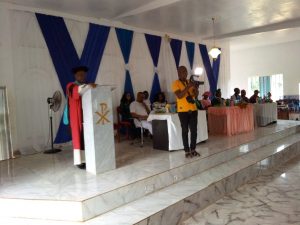Rev. Fr. Anthony Banye, school principal delivering his address at the graduation/prize giving day.
