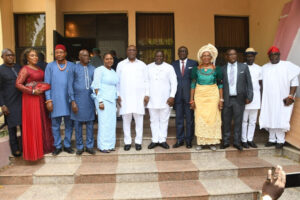Delta Deputy Governor, Deacon Kingsley Otuaro, representing Governor Ifeanyi Okowa (6th left), the Deputy Speaker, Delta State House of Assembly, Rt. Hon Christopher Ochor, representing the Speaker (6th right), member representing Warri Federal constituency, Hon Thomas Ereyitomi (right), Secretary to the State Government, Chief Patrick Ukah (5th right), and the member representing Ika South Constituency in DTHA, , Hon Festus Okoh (left) with the newly sworn-in Chairman and members of the Delta State House Assembly Service Commission in Asaba on Monday.