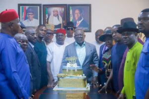 The law makers with anniversary cake.