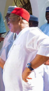 The wristwatch on the governor's wrist.