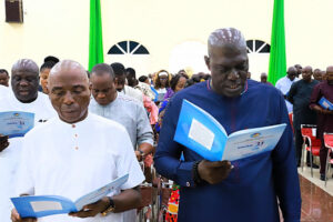 Senator James Manager, left, and Olorogun Kingsley Esiso at the anniversary service.